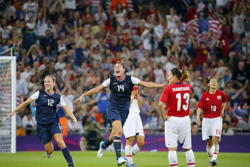 Abby Wambach of the US celebrates after winning the women's soccer final gold medal match