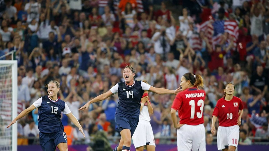 Abby Wambach of the US celebrates after winning the women's soccer final gold medal match