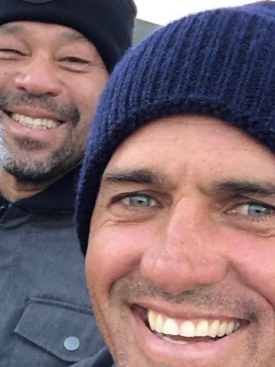 A selfie shot showing the close-up faces of Sunny Garcia and Kelly Slater.
