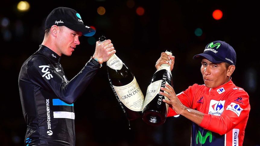 Time to celebrate ... Nairo Quintana (R) and Christopher Froome toast on the podium