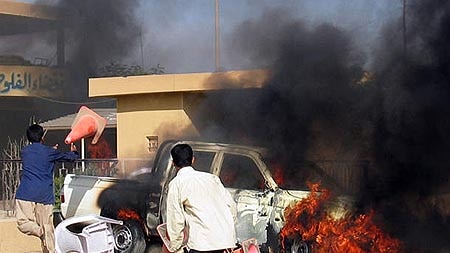 Police car burns in Fallujah