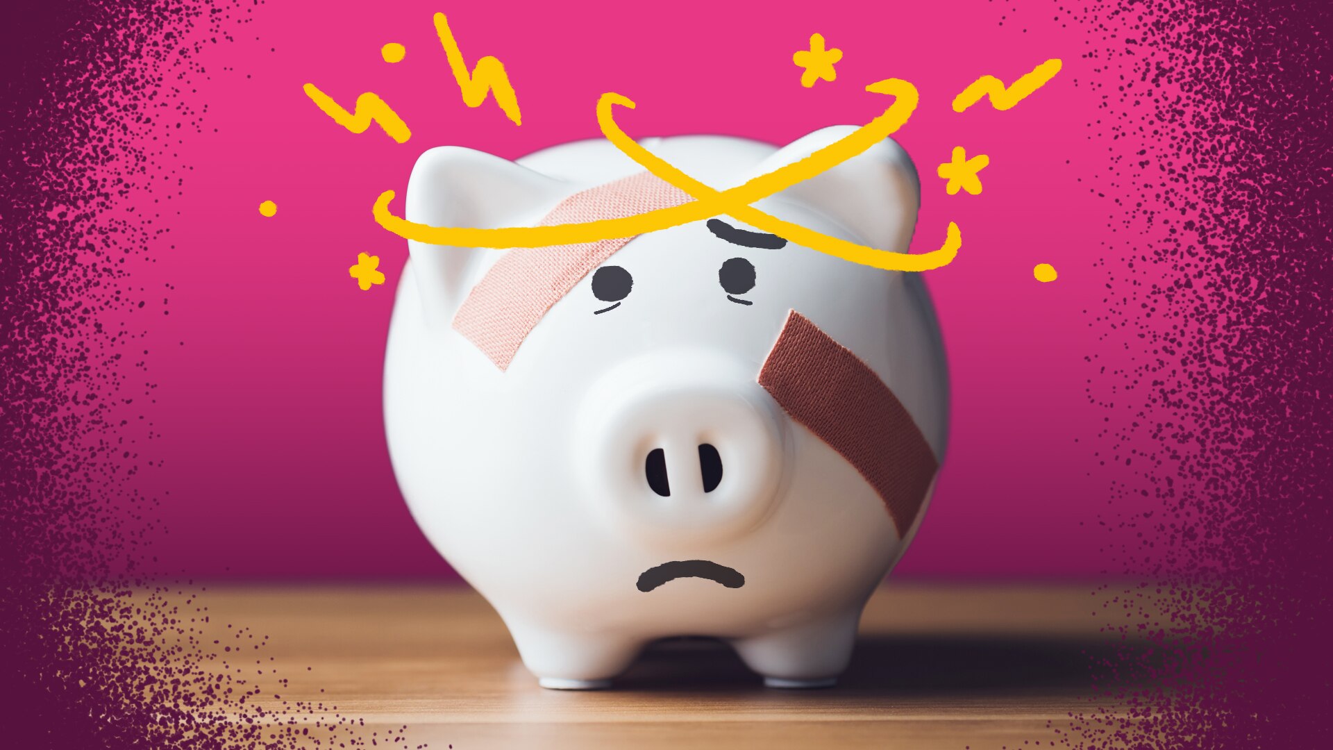 A piggy bank sits on a table with band-aids on it, depicting financial hardship.