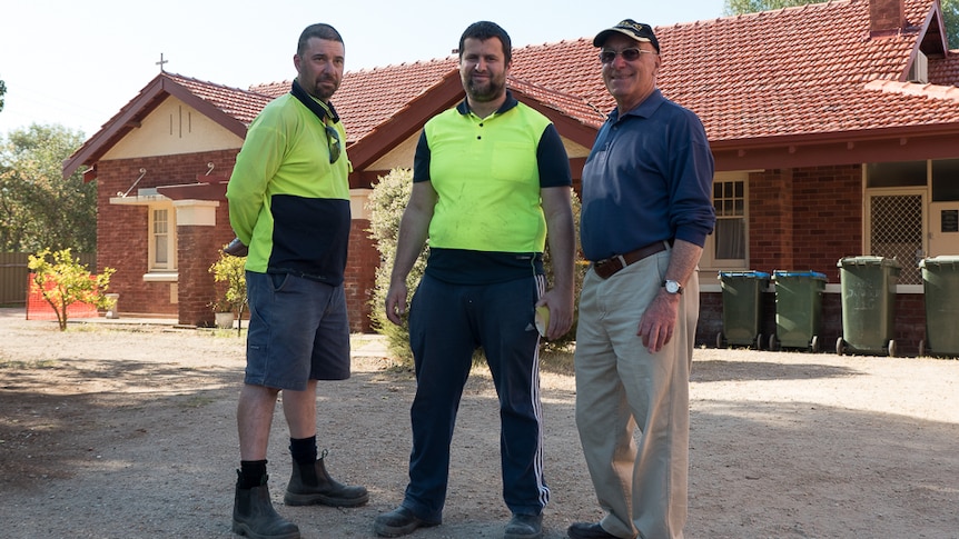 Evan Ormsby, Stuart Kotzias and Dr Tony Ielasi out front of the St Therese Church house.