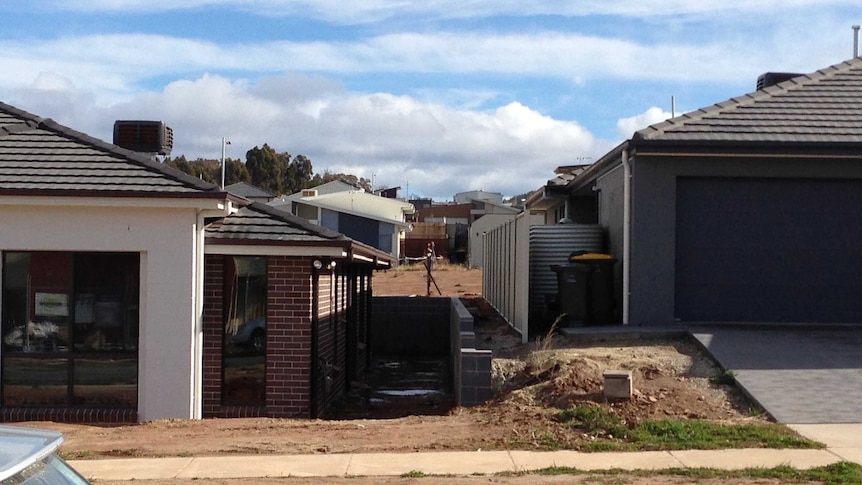 Overshadowing of a typical house at noon in the suburb of Wright in Canberra.