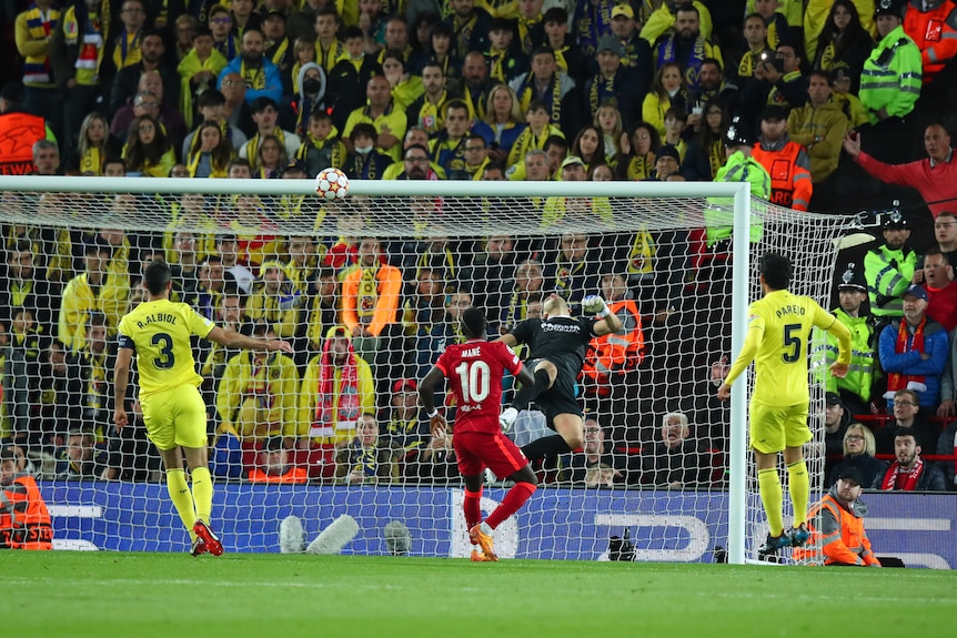 Villarreal's goalkeeper Geronimo Rulli fails to stop the ball going in the net against Liverpool