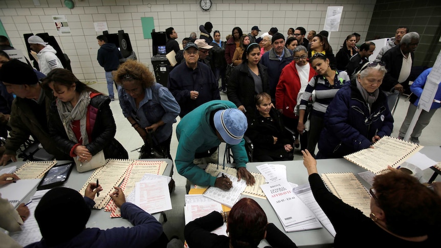 Voters register to vote during the US presidential election.