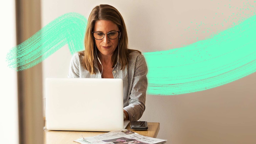 Woman working on a laptop at a small desk, with an illustrated aqua brush line behind her.