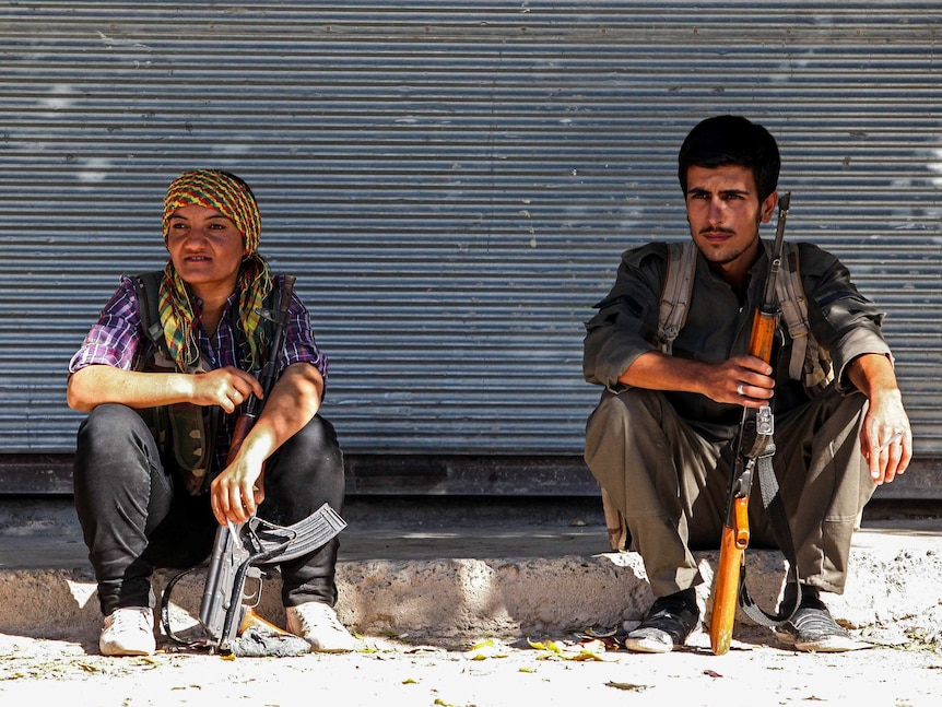 Kurdish fighters in Kobane