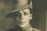 A black and white photo of a man of Indigenous appearance in a soldier's uniform