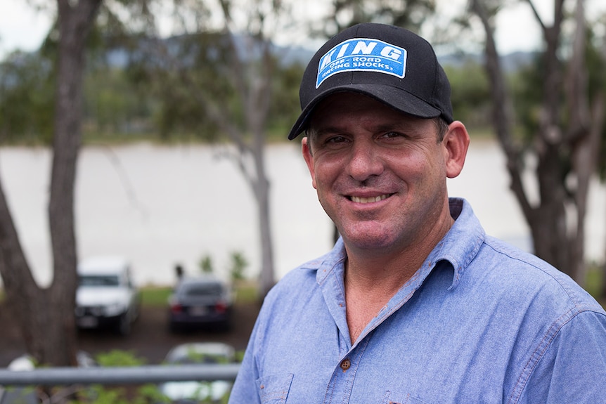 Portrait of Billy Geddes. Fitzroy river and trees blurry in background