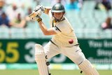Chris Rogers drives on day one of the second Ashes Test