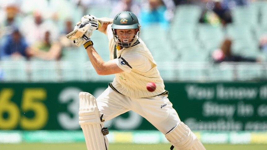 Chris Rogers drives on day one of the second Ashes Test