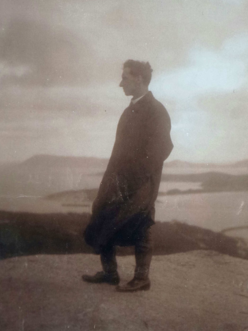 Padre Arthur Ernest White stands on the top of Mt Clarence, Albany