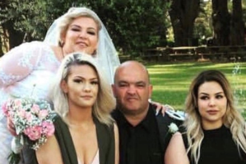 Truck driver Stavros Kostaras with daughter Elizabeth and others.