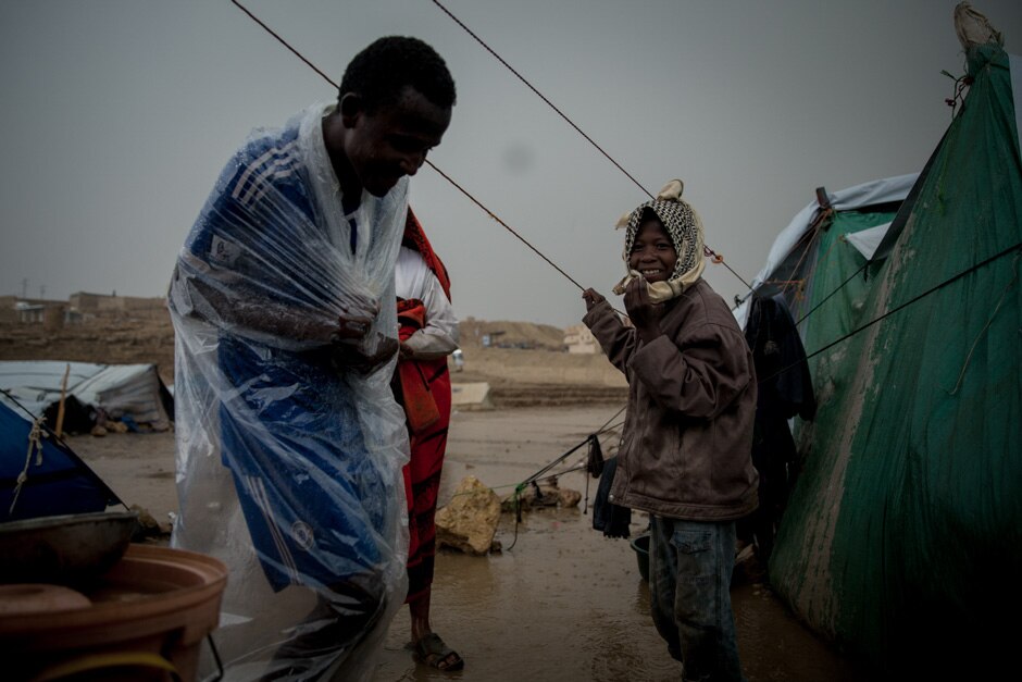 A thunderstorm floods many of the displaced families’ tents in Amran province.
