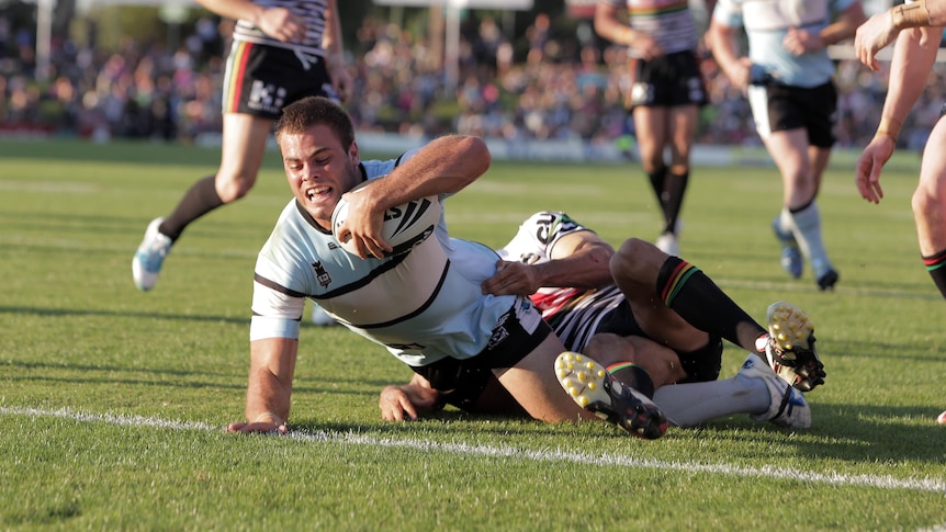 Close encounter ... the Sharks downed the Panthers in a thriller in Penrith