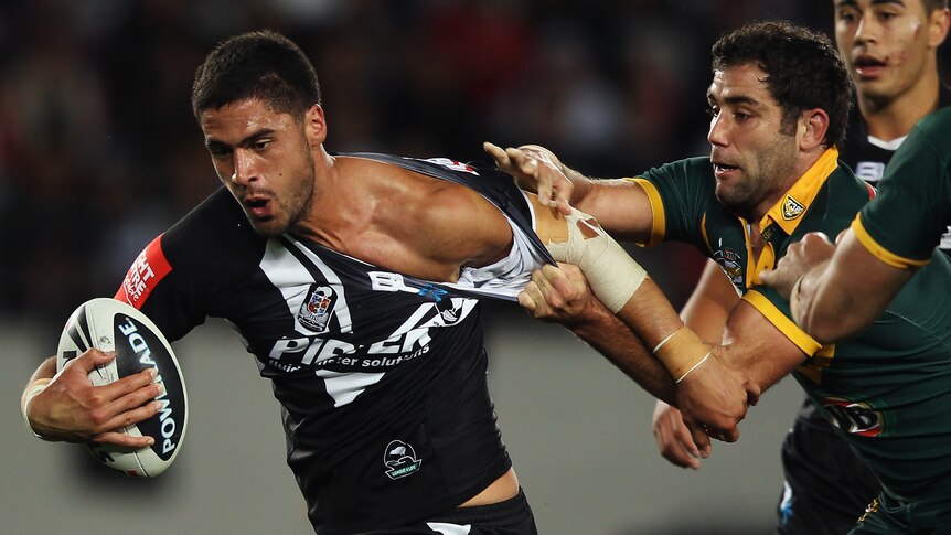 Jesse Bromwich tries to brush off Cameron Smith.