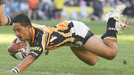 Benji Marshall scores the first try of the match.