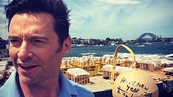 Hugh Jackman holds firework