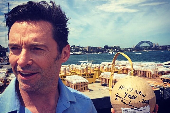 Hugh Jackman holds firework