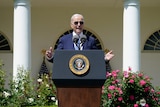 Joe Biden at a lectern.