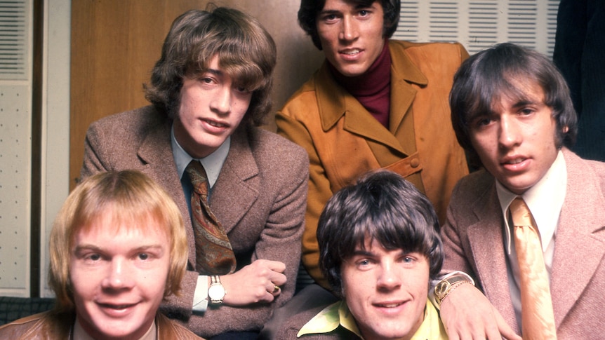 The five members of the Bee Gees as they were in 1967, posing for a photograph