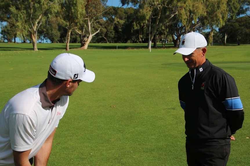 Legendary golf coach Ritchie Smith with player Jaryyd Felton.