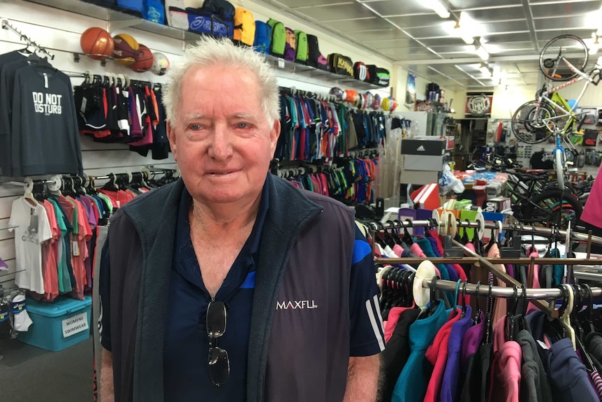 Brian Hedge stands in a sporting goods store in Dalby