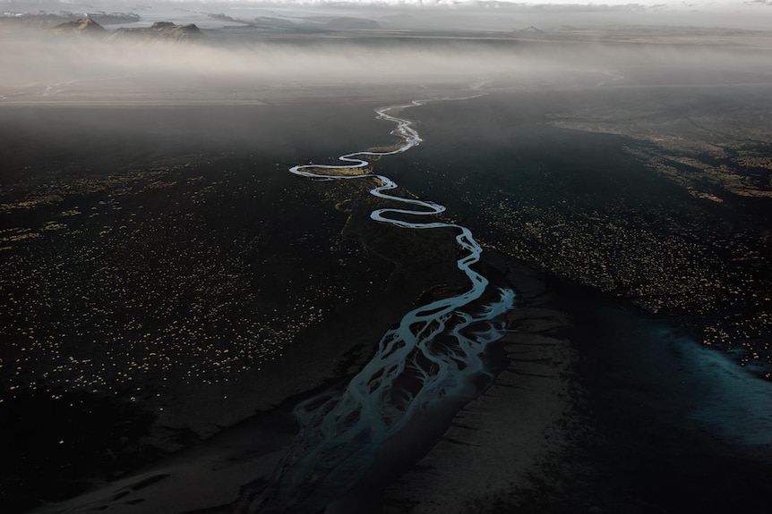 A river stretching to the horizon