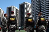 Soldiers patrol the Olympic Village in Rio