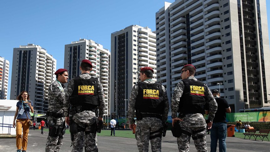 Soldiers patrol the Olympic Village in Rio