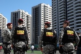 Soldiers patrol the Olympic Village in Rio