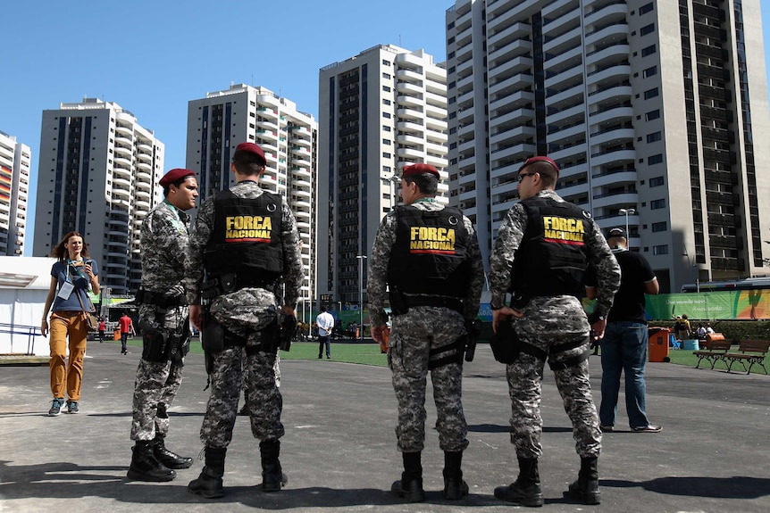 Soldiers patrol the Olympic Village in Rio