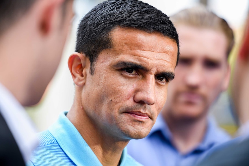 Tim Cahill fronts the media