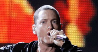 Eminem holding a microphone