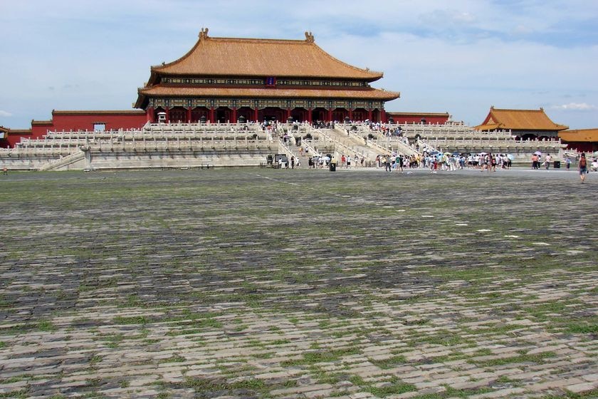 Tourists gather inside the Forbidden City located in Beijing's Tiananmen Square