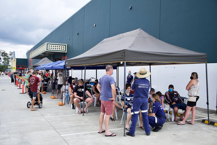 People at a Pfizer COVID-19 vaccination pop-up clinic outside a Bunnings hardware store in Queensland.