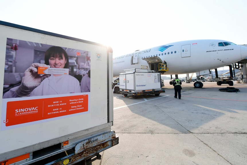 Sinovac waits to be loaded onto an Indonesian plane at the Beijing International Airport