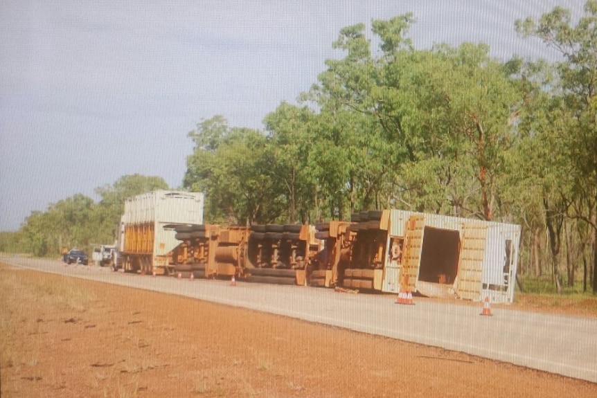 A road train has overturned near Mataranka in the NT