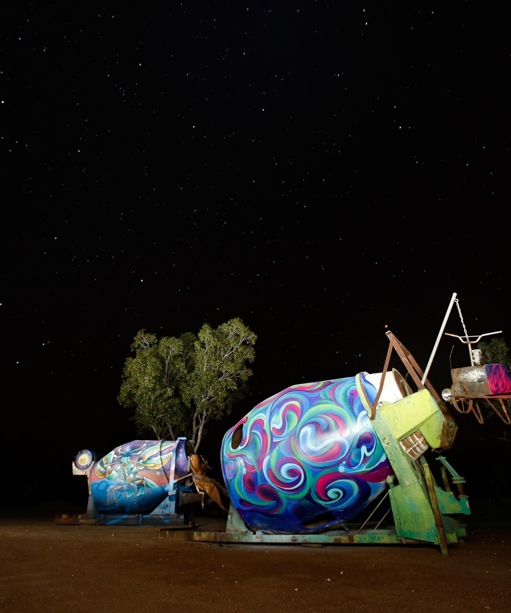 Street artists turn rusting opal machinery into outback spectacle