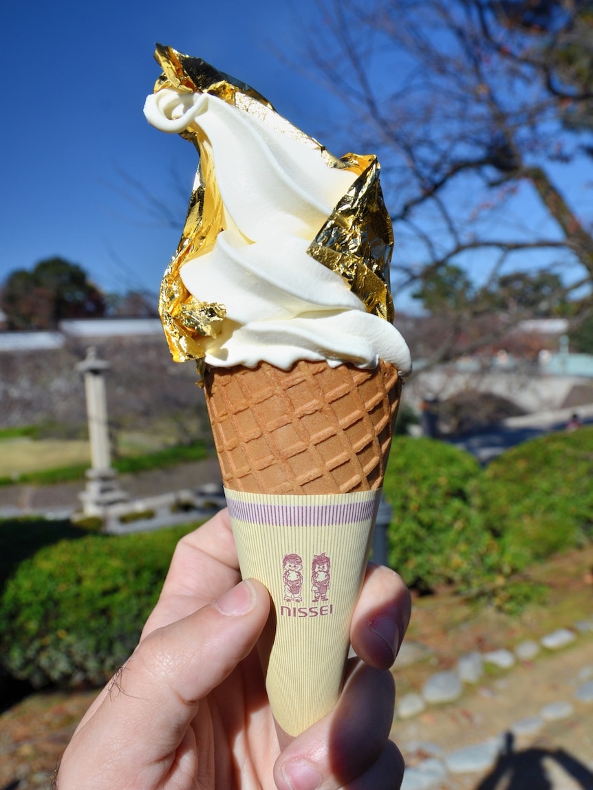 Soft serve covered in gold leaf