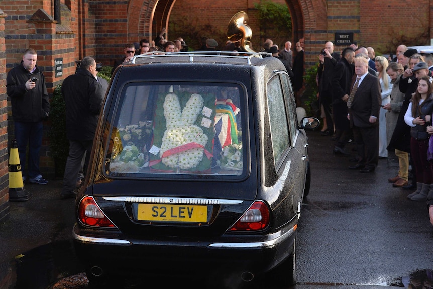 The funeral cortege of Ronnie Biggs arrives at Golders Green Crematorium in north London