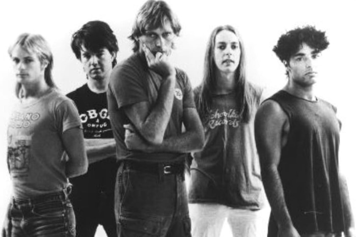 Rock group with five young men in the 1980s.