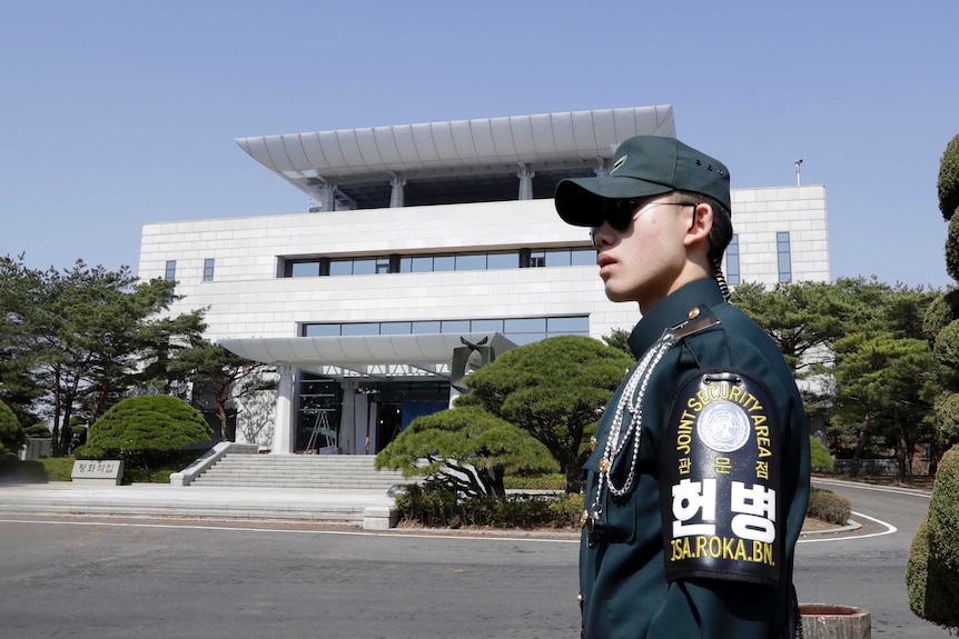 A South Korean soldier stands outside of the Peace House.