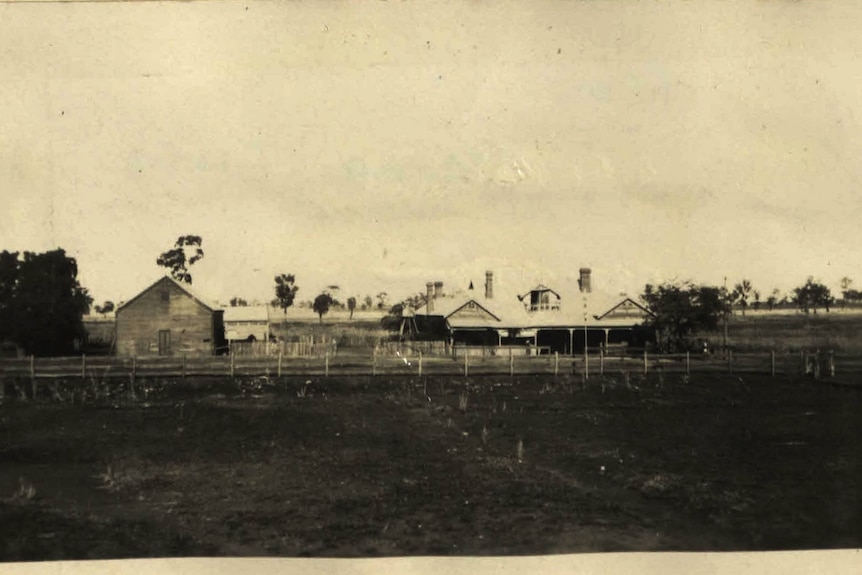 A sepia photo of a historic pub.