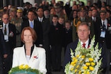 Julia Gillard and New Zealand defence minister Wayne Mapp lay wreaths at the Korean War Memorial Museum.