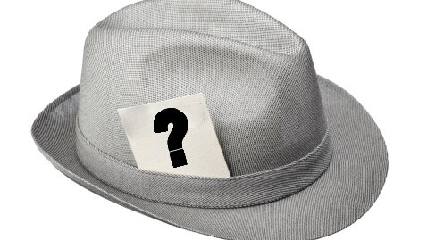 Press hat with question mark note in the band (Thinkstock)