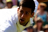 Novak Djokovic returns against Richard Gasquet