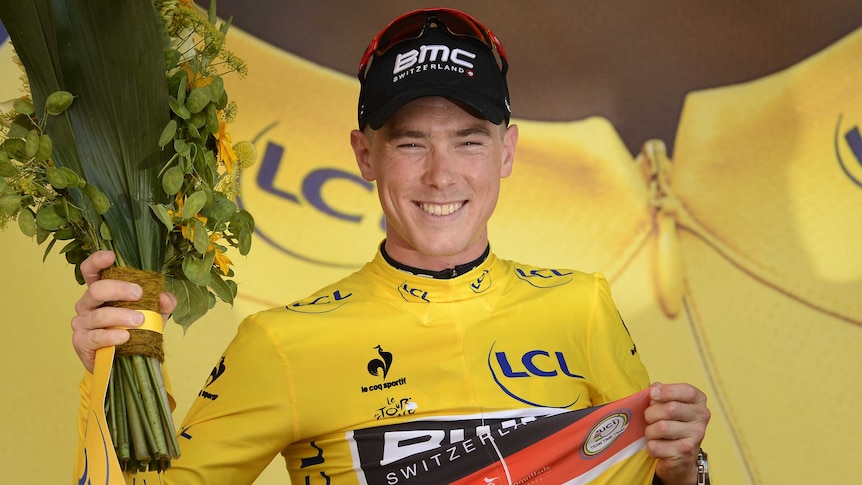 Australia's Rohan Dennis celebrates his yellow jersey at the Tour de France