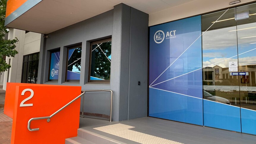 An ACT Government building entrance with an automatic door.